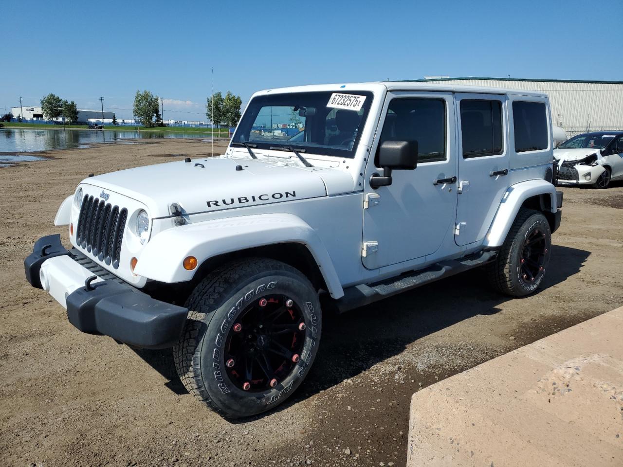 2012 Jeep Wrangler Unlimited Sahara, VIN 1C4BJWEG9CL275853 — Ранее повреждён