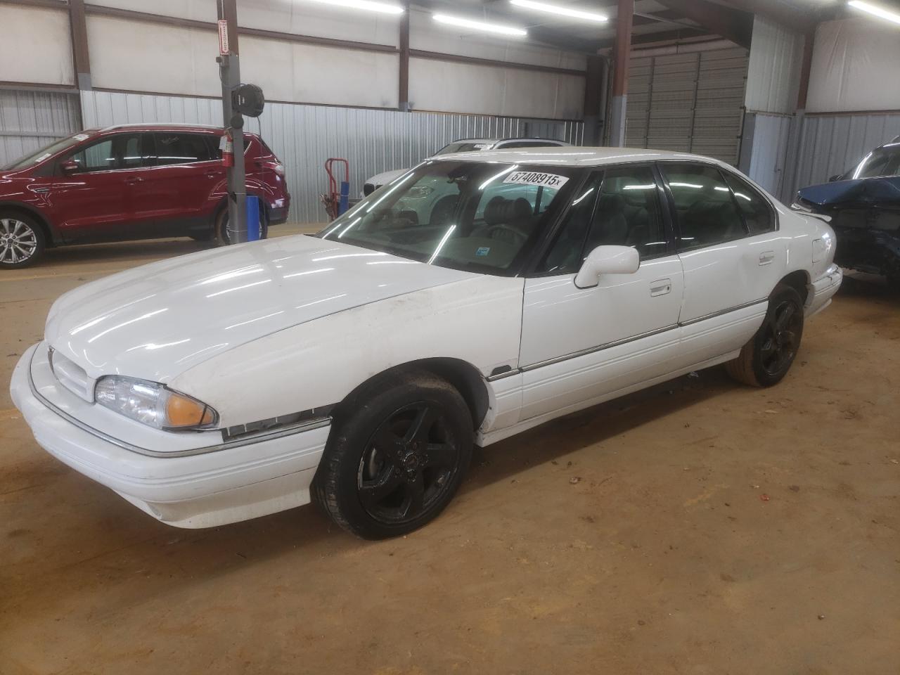 1993 Pontiac Bonneville SE, VIN 1G2HX53L2P1224378 — Vandalism