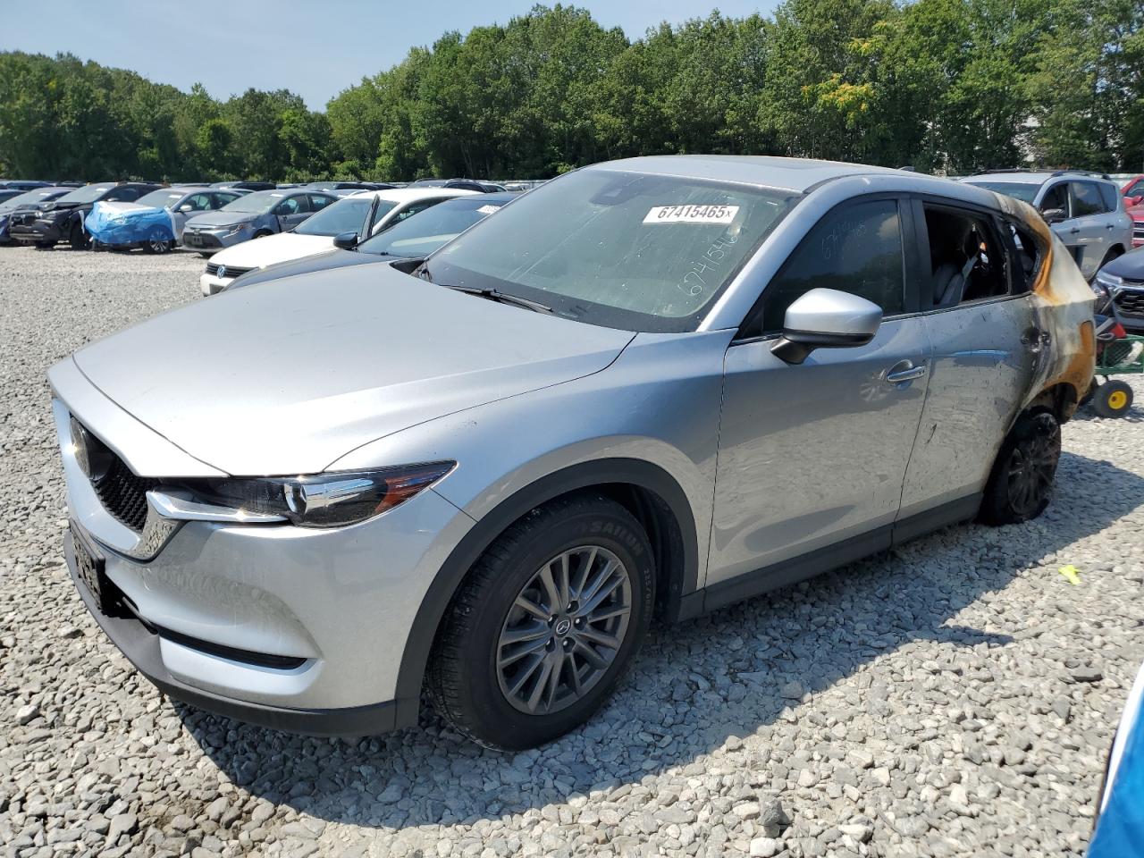 2021 Mazda CX-5 Touring, VIN JM3KFBCM4M1392568 — Interior fire