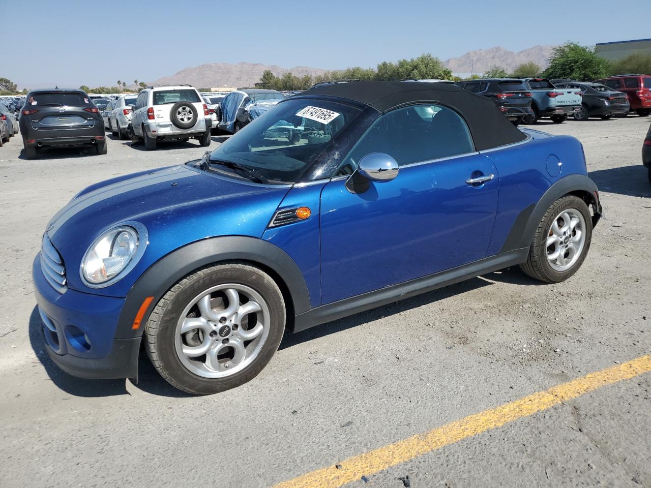 2012 MINI Roadster, VIN WMWSY1C57CT311679 — Rear end