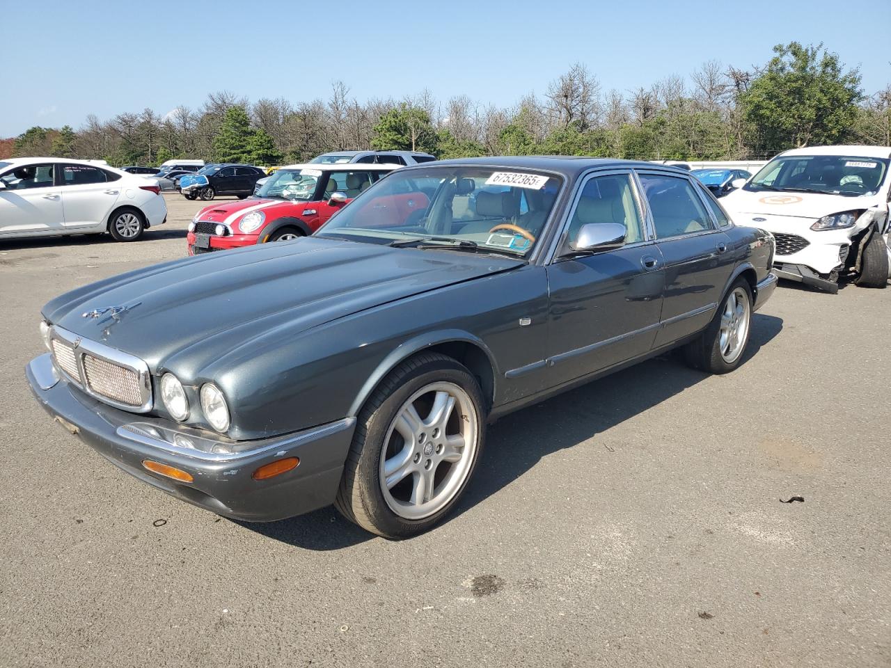 1999 Jaguar XJ, VIN SAJHX1043XC857446 — Rear end
