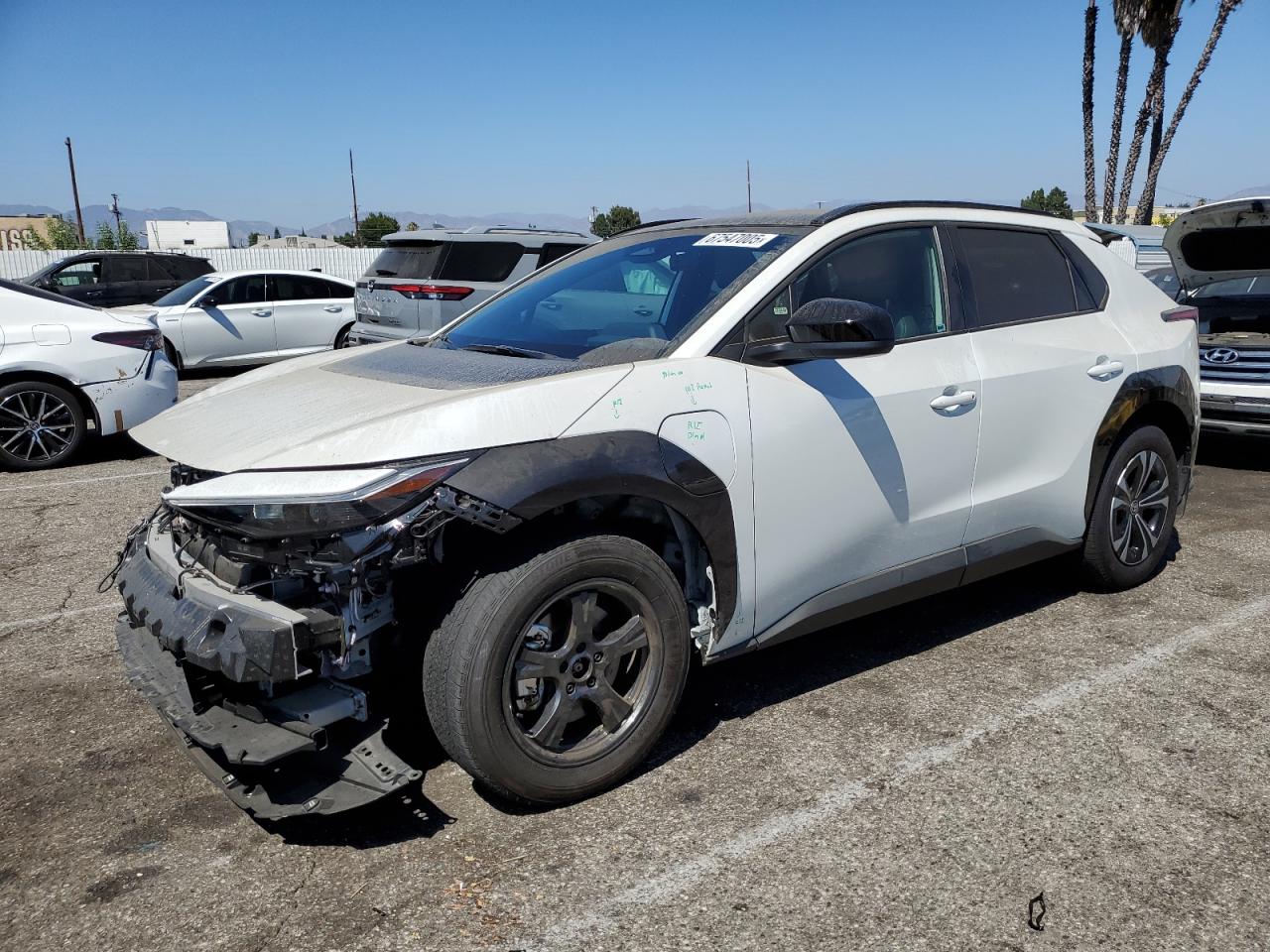 2024 Toyota bZ4X XLE, VIN JTMAAAAA8RA044060 — Front end
