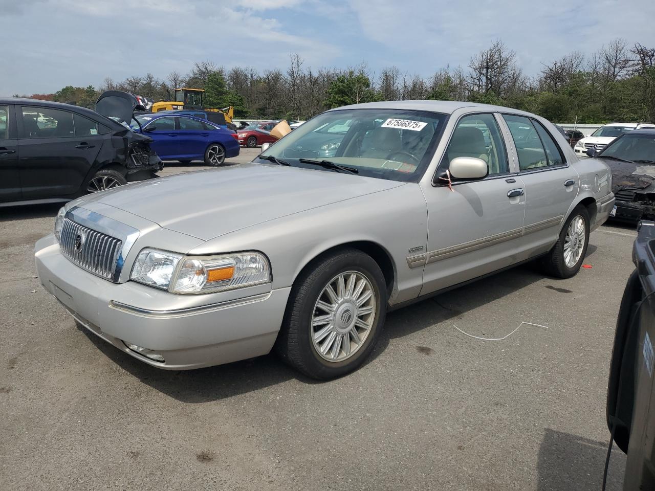 2010 Mercury Grand Marquis LS, VIN 2MEBM7FV7AX616370 — Normal wear
