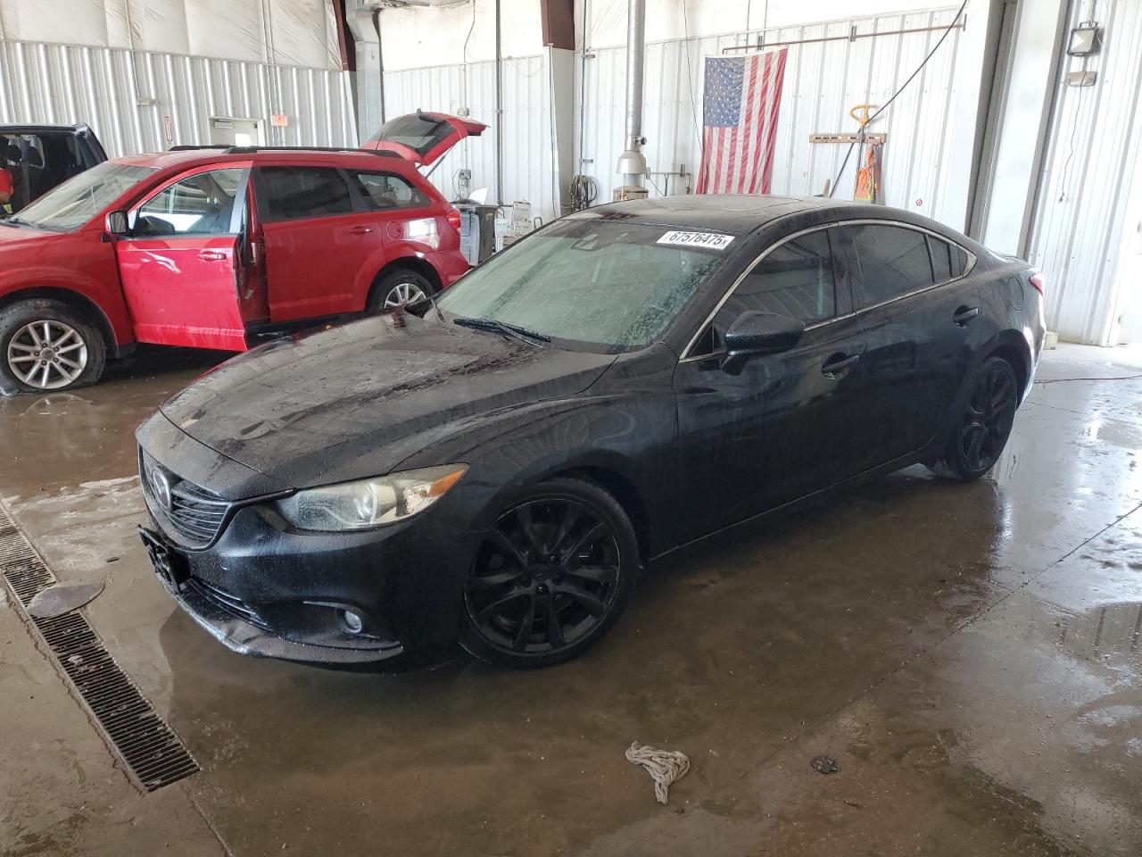 2014 Mazda 6 i Grand Touring, VIN JM1GJ1W64E1126666 — Vandalism