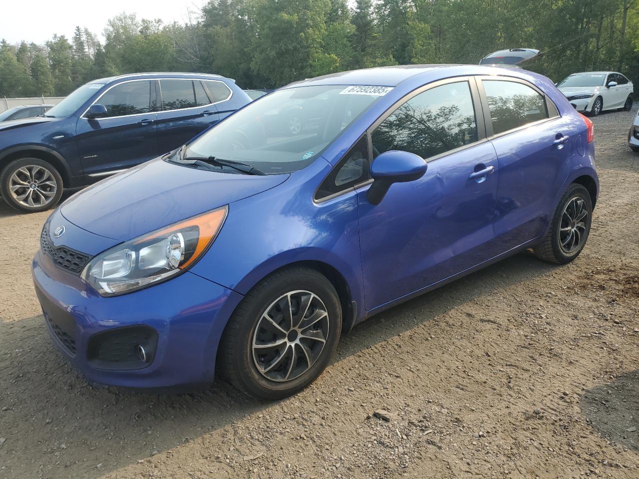 2013 Kia Rio LX, VIN KNADM5A39D6813011 — Rear end