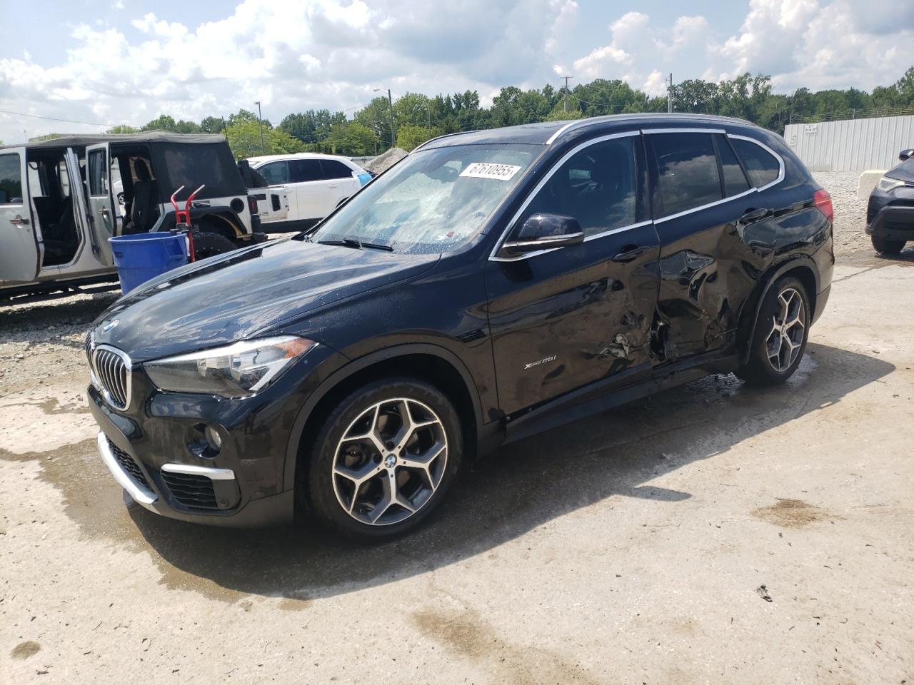 2016 BMW X1 xDrive28i, VIN WBXHT3C3XG5E56303 — Side