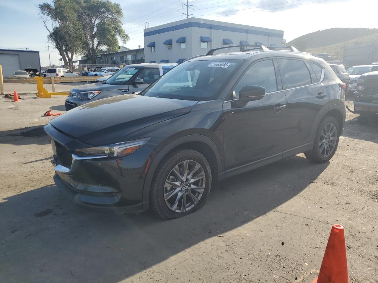 2021 Mazda CX-5 Signature, VIN JM3KFBEY8M0418515 — Front end
