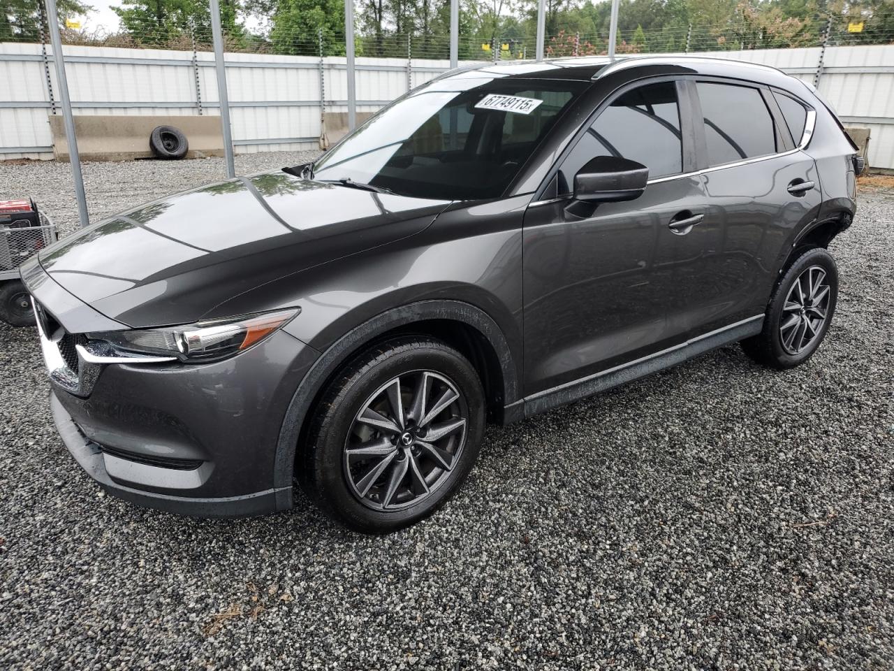 2018 Mazda CX-5 Touring, VIN JM3KFACM6J1397793 — Rear end