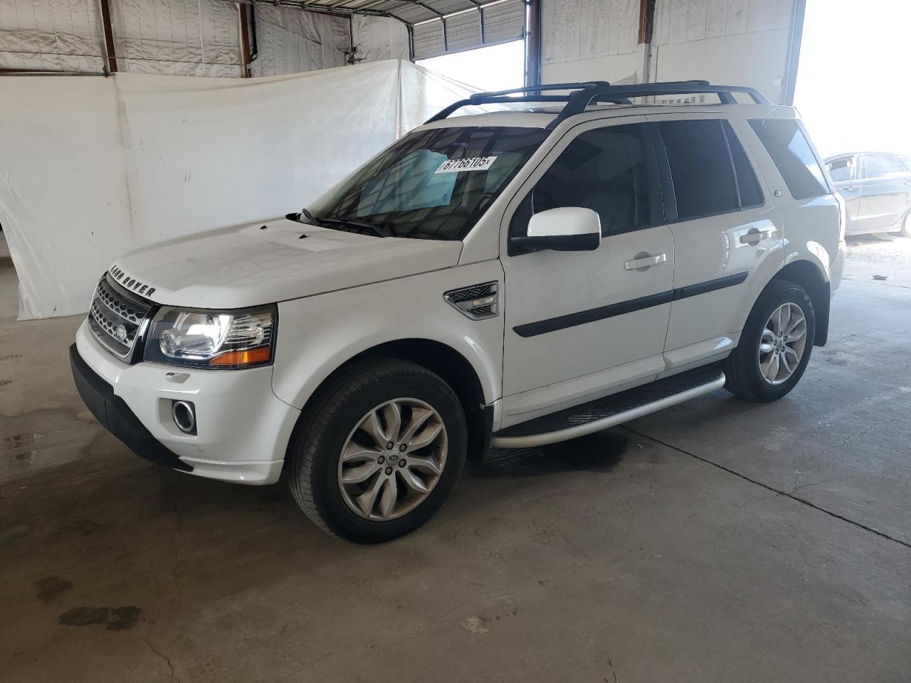 2013 Land Rover LR2, VIN SALFR2BGXDH335790 — Auction photo