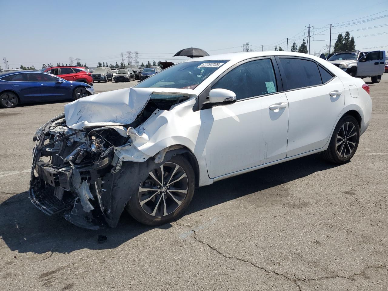 2018 Toyota Corolla L, VIN 5YFBURHE3JP744765 — Front end