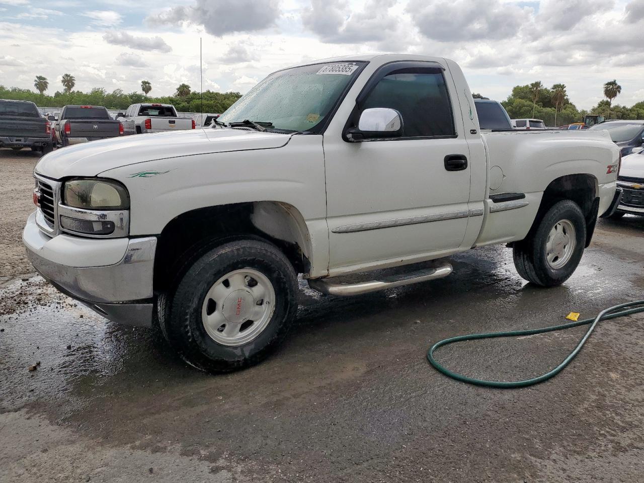 2002 GMC Sierra 1500 SLE, VIN 1GTEK14T82Z207695 — Prior damage history