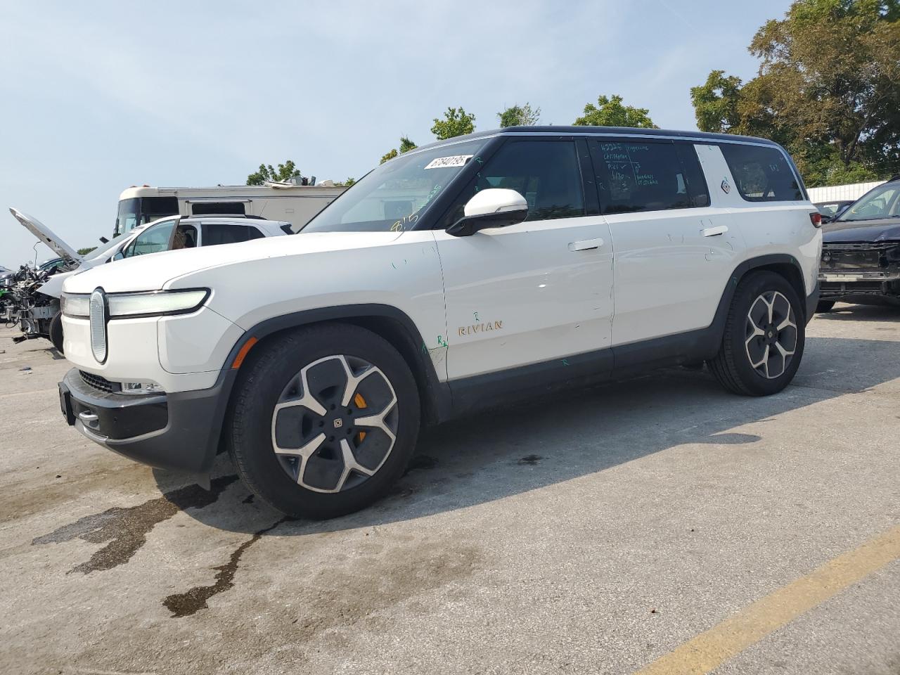 2023 Rivian R1S Adventure, VIN 7PDSGABA2PN015945 — Hail