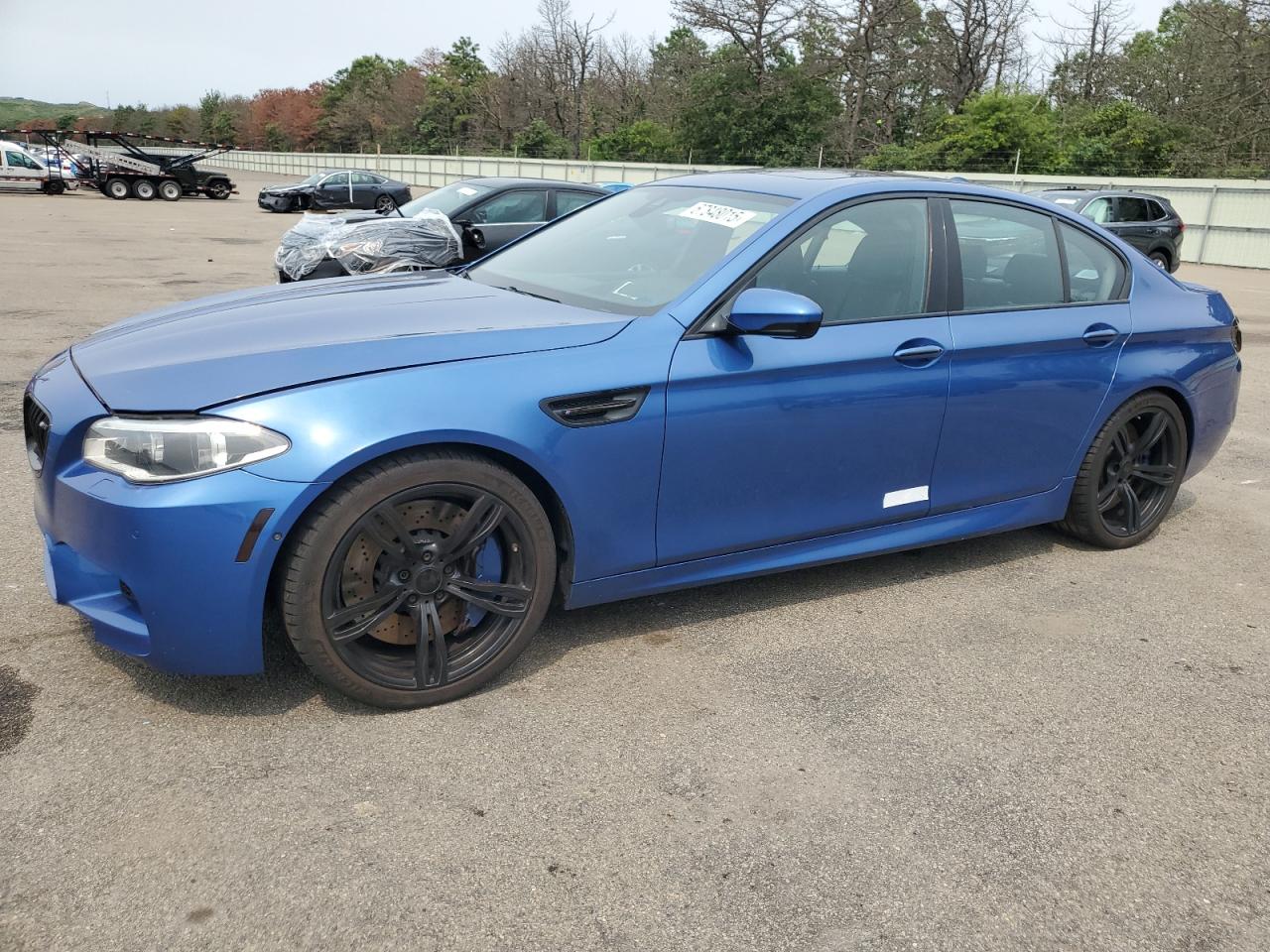 2015 BMW M5, VIN WBSFV9C50FD594493 — Вода / потоп