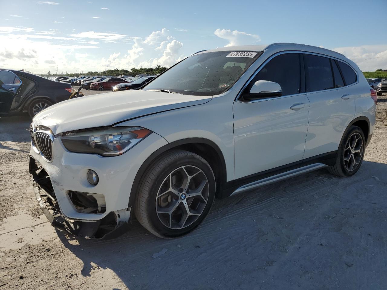 2018 BMW X1 sDrive28i, VIN WBXHU7C32J5L09594 — Front end