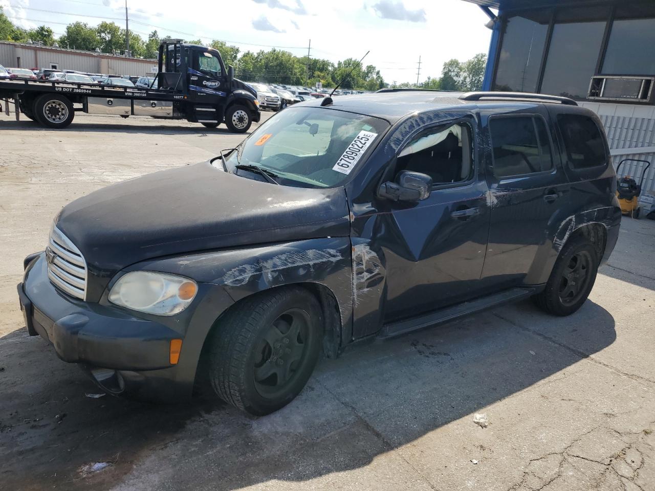 2011 Chevrolet HHR 1LT, VIN 3GNBABFWXBS502630 — Side
