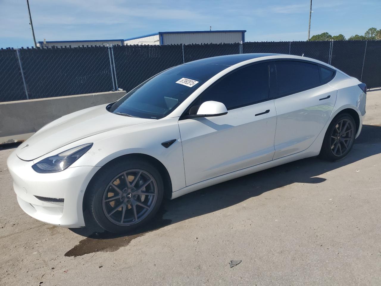 2021 Tesla Model 3 Standard Range Plus, VIN 5YJ3E1EA7MF093452 — Minor dents and scratches