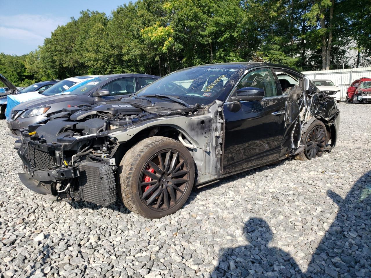 2018 Maserati Ghibli S Q4 GranLusso, VIN ZAM57YTL6J1278589 — Side