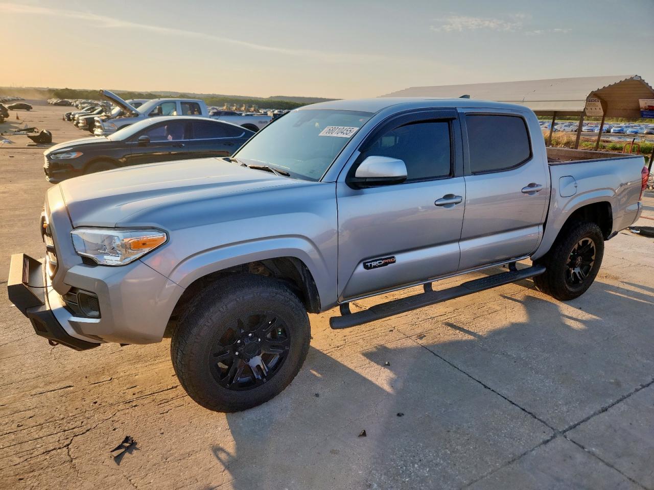 2019 Toyota Tacoma SR, VIN 5TFAX5GNXKX138623 — Side