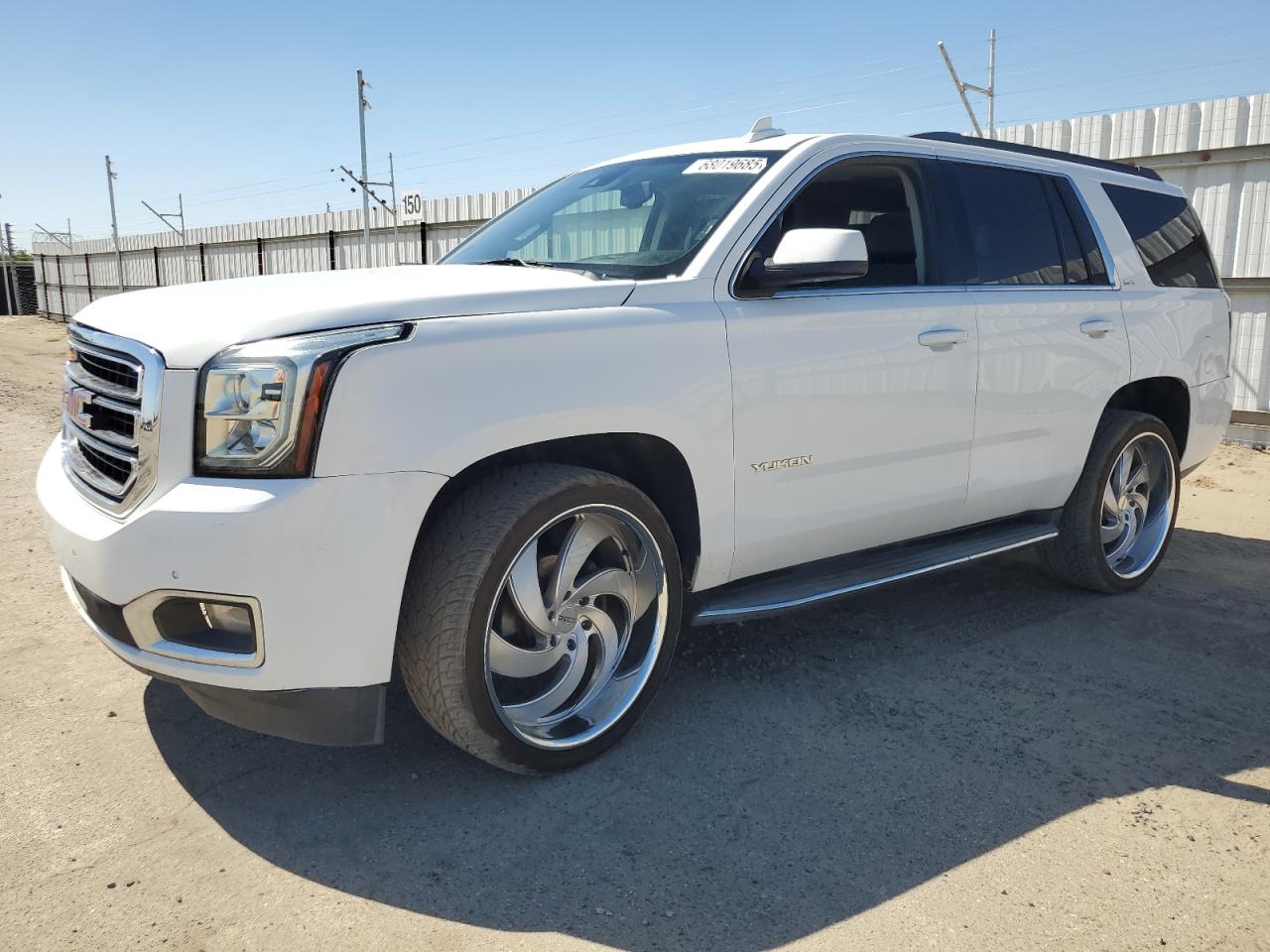 2019 GMC Yukon SLT, VIN 1GKS2BKC0KR174143 — Prior damage history