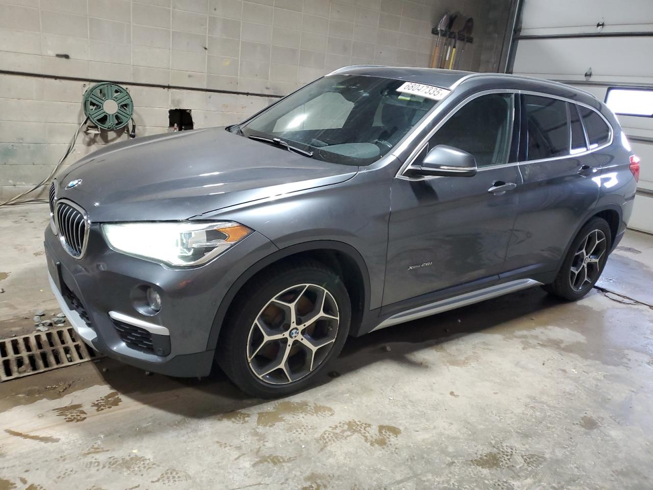 2016 BMW X1 xDrive28i, VIN WBXHT3C31G5F66074 — Undercarriage