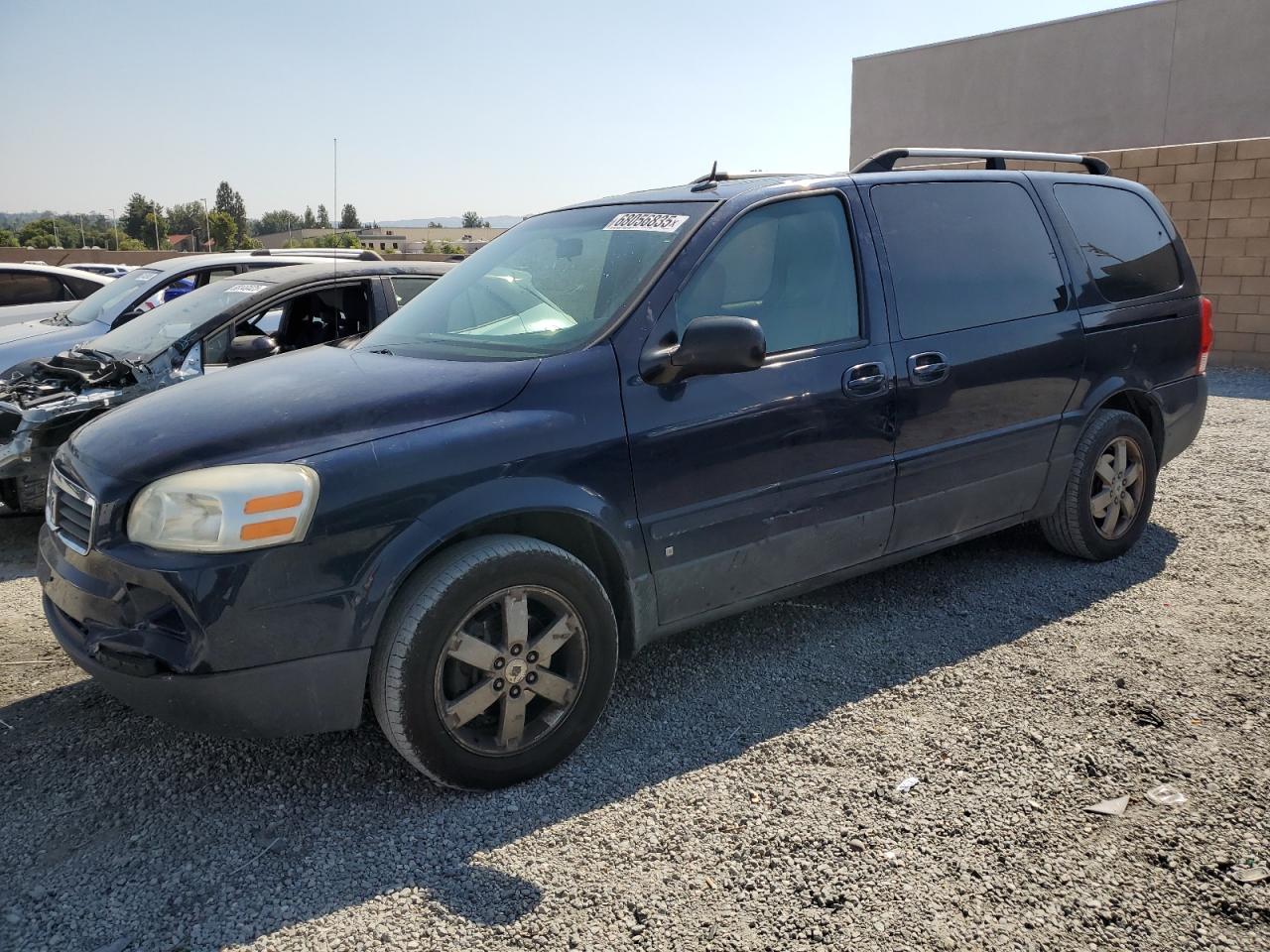 2007 Saturn Relay 3, VIN 5GZDV231X7D142845 — Бок