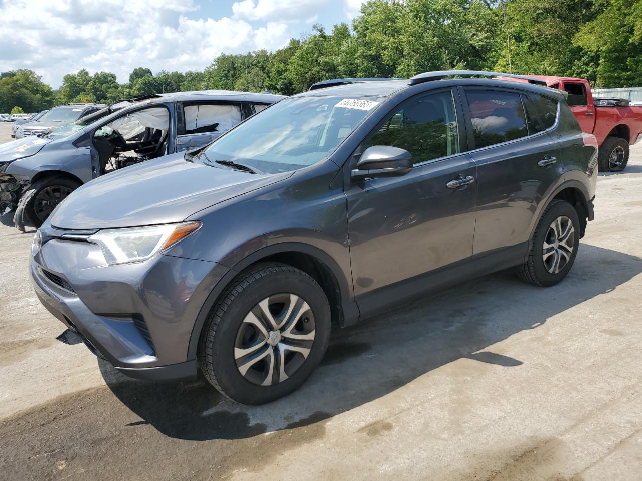 2017 Toyota RAV4 LE, VIN JTMBFREV6HJ106118 — Rear end
