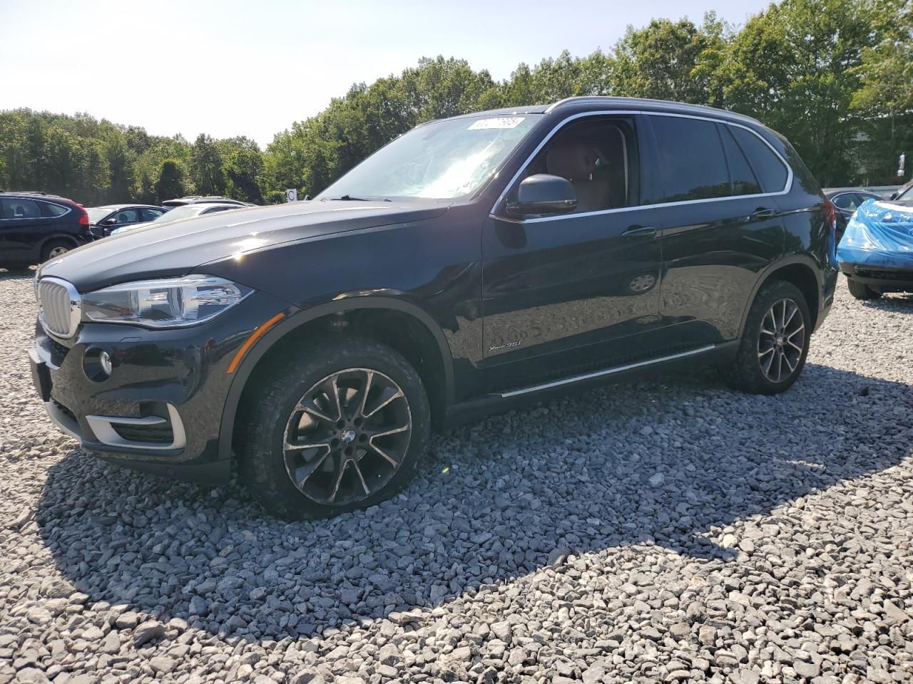 2015 BMW X5 xDrive35i, VIN 5UXKR0C5XF0K61469 — Side