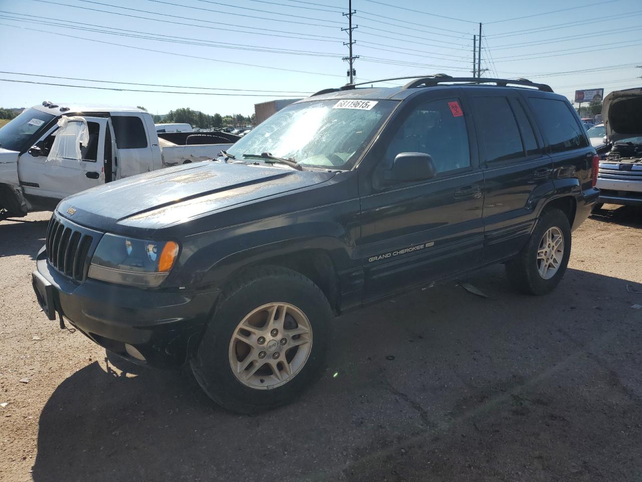 1999 Jeep Grand Cherokee Limited, VIN 1J4GW68N4XC736393 — Front end