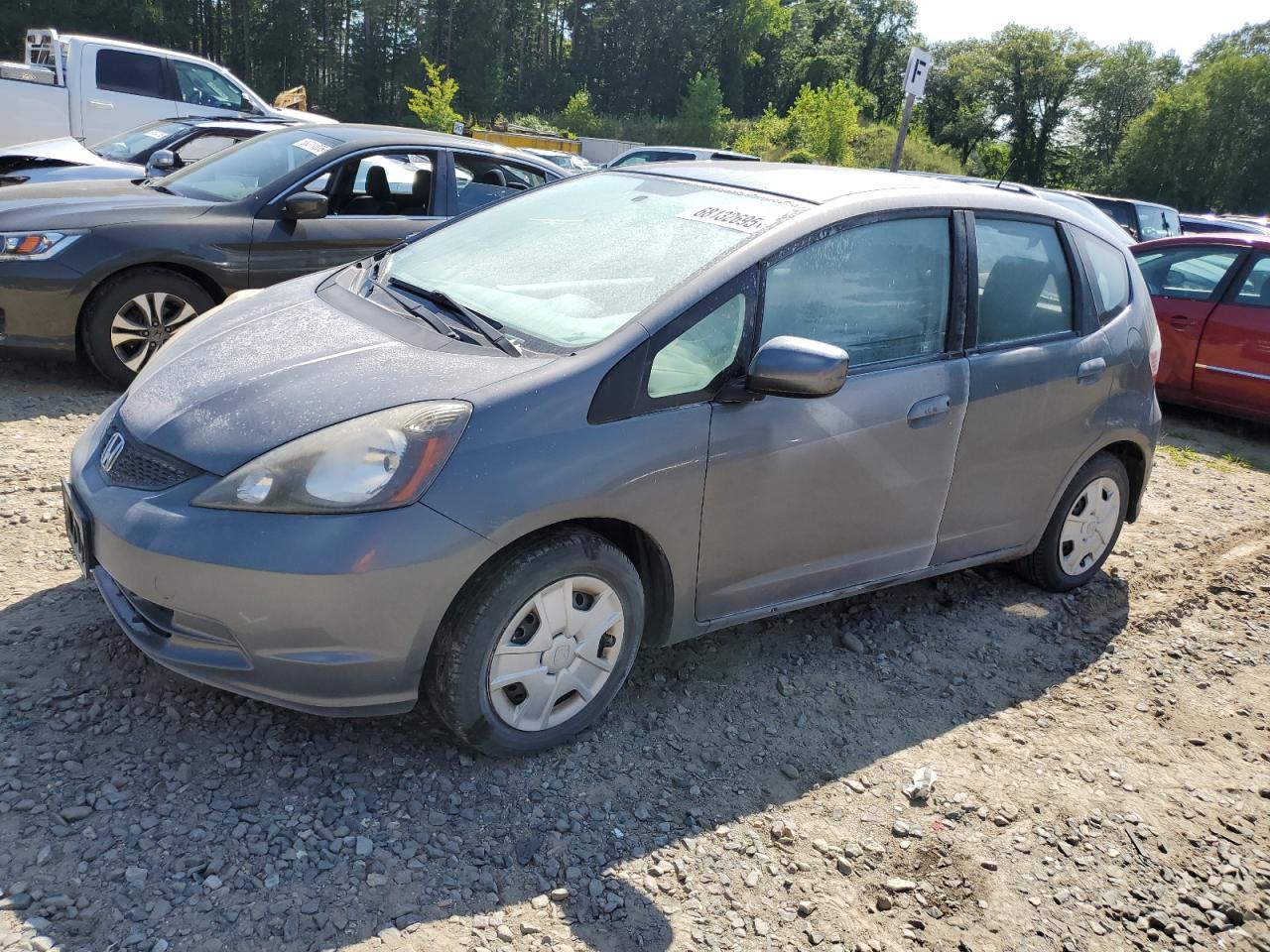 2013 Honda Fit, VIN JHMGE8G39DC058111 — Пожар в салоне