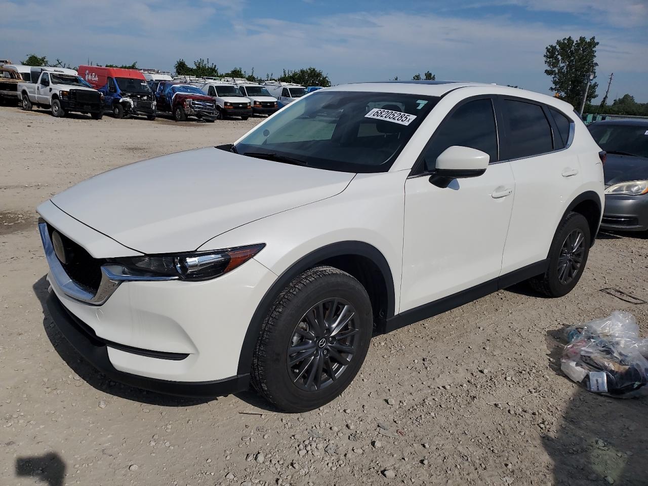 2021 Mazda CX-5 Touring, VIN JM3KFBCM9M0427336 — Undercarriage
