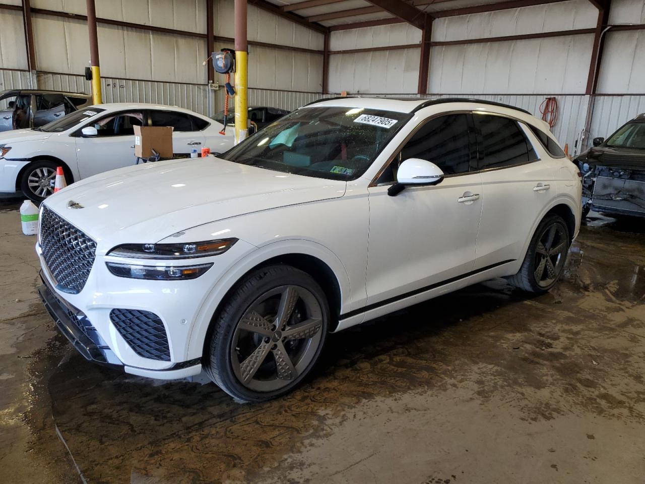 2022 Genesis GV70 Sport, VIN KMUMCDTC6NU062795 — Side