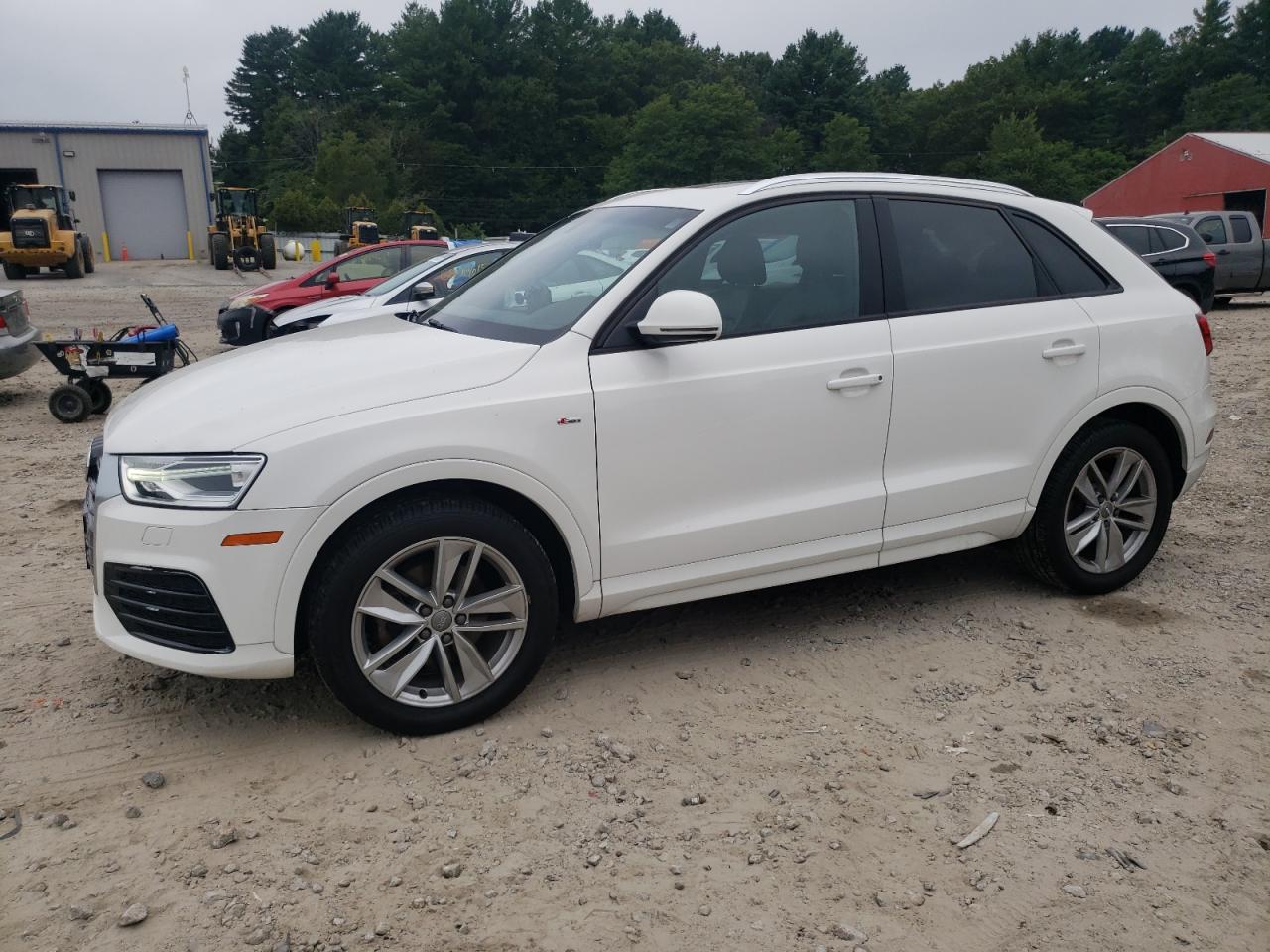 2018 Audi Q3 Premium, VIN WA1ECCFSXJR026670 — Side