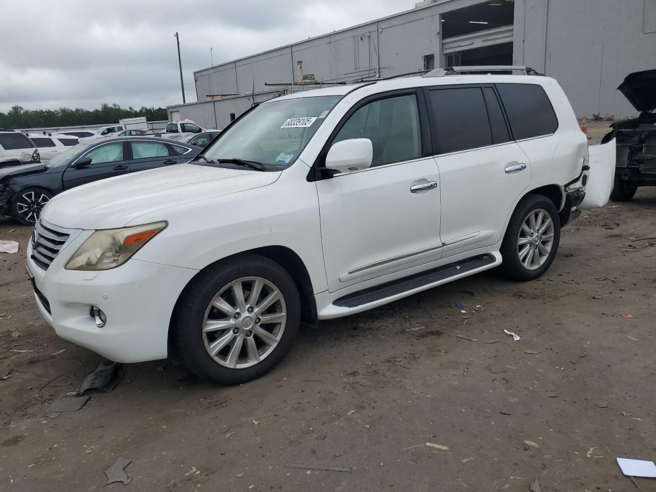2009 Lexus LX 570, VIN JTJHY00W494018858 — Зад