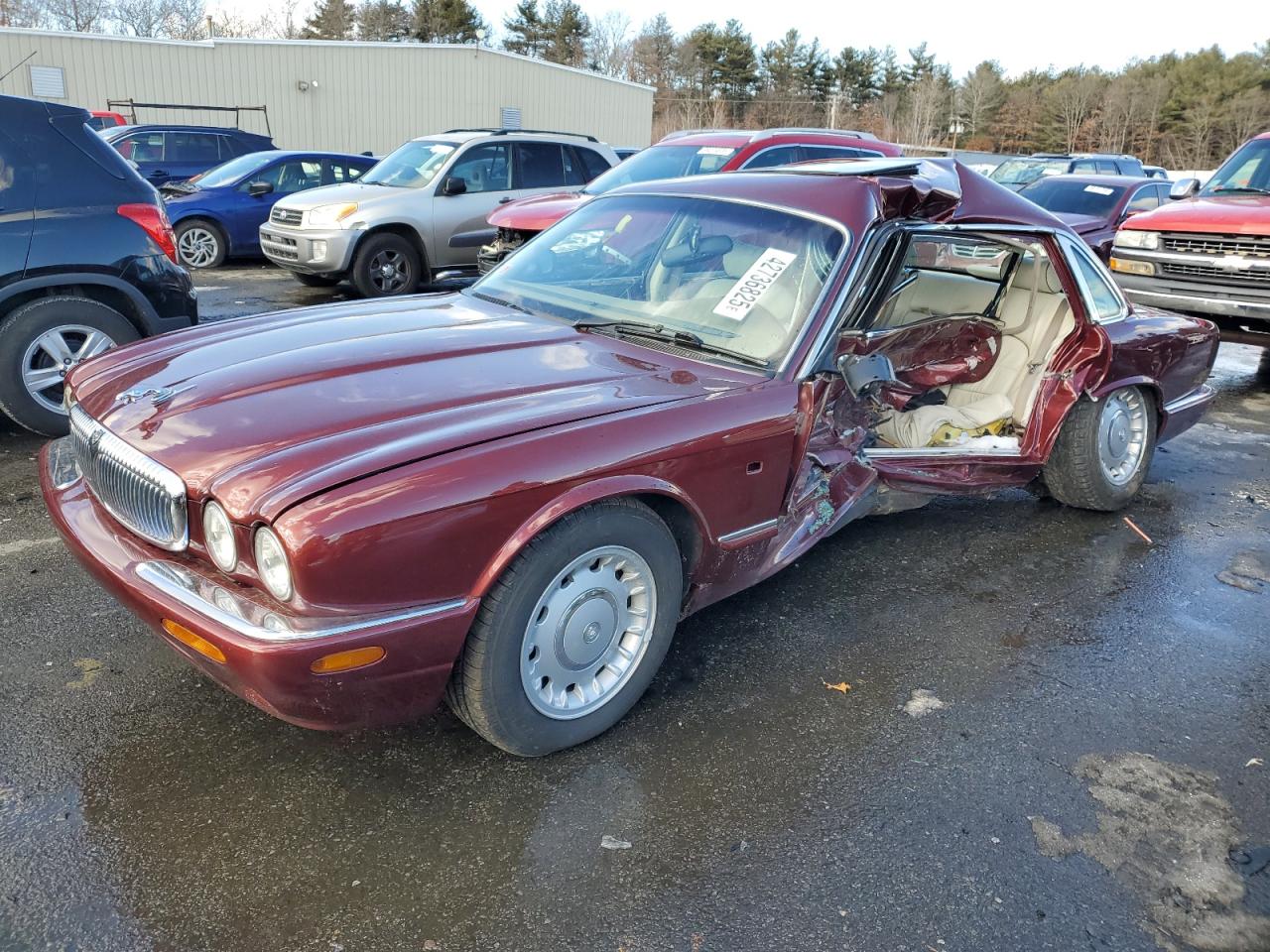 1998 Jaguar XJ Vanden Plas, VIN SAJKX6247WC813917 — Side