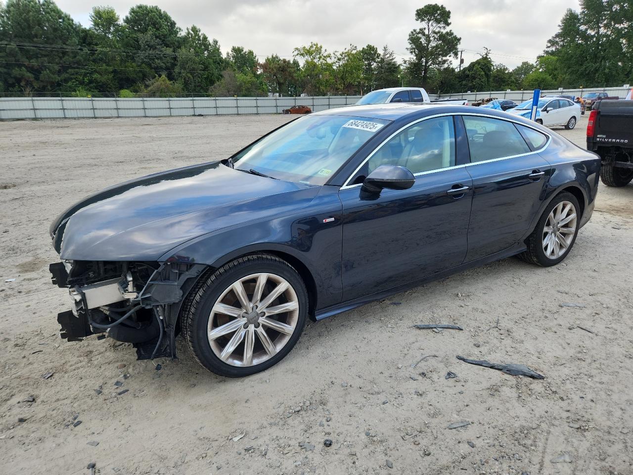 2014 Audi A7, VIN WAU2MBFCXEN028969 — Auction photo