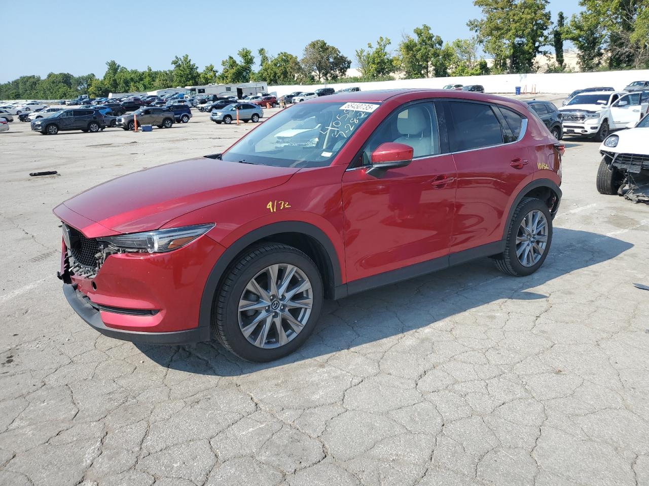 2021 Mazda CX-5 Grand Touring, VIN JM3KFBDM7M1474793 — Front end