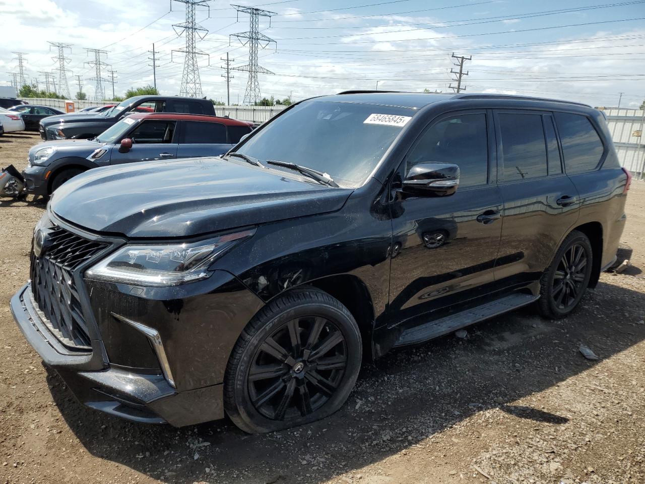2020 Lexus LX 570, VIN JTJDY7AXXL4312075 — Бок