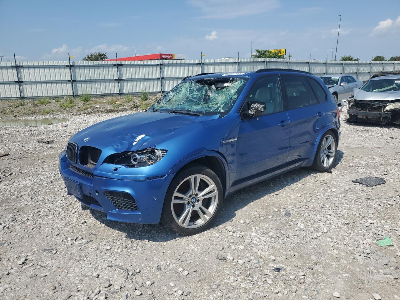 2012 BMW X5 M, VIN 5YMGY0C55CLK27161 — Фото с аукциона