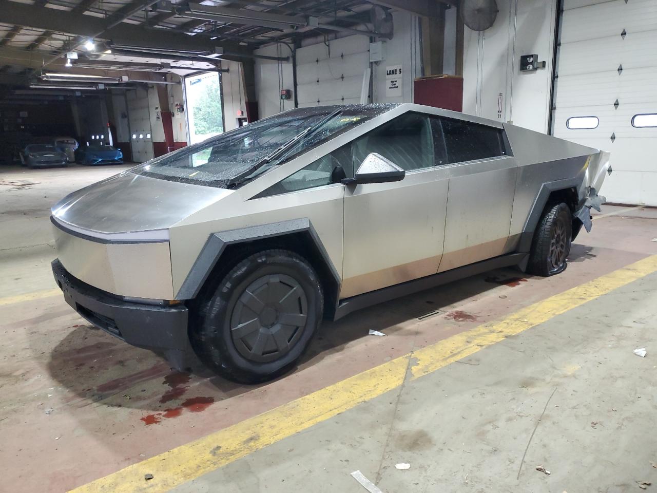 2025 Tesla Cybertruck, VIN 7G2CEHED1SA064765 — Rear end