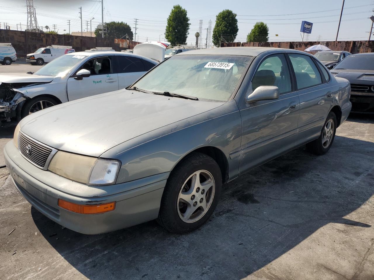 1997 Toyota Avalon XL, VIN 4T1BF12B0VU182211 — Minor dents and scratches