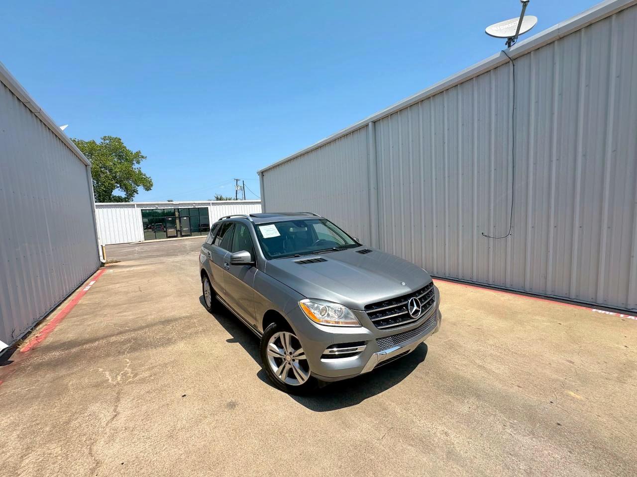 2015 Mercedes-Benz M 350, VIN 4JGDA5JB1FA585083 — Minor dents and scratches