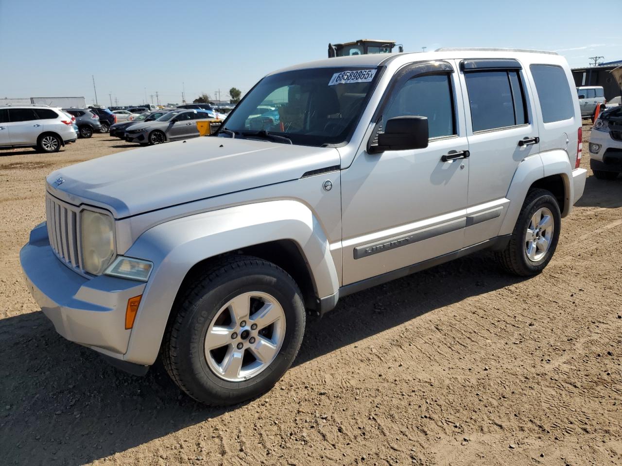 2012 Jeep Liberty Sport, VIN 1C4PJMAK7CW122682 — Град