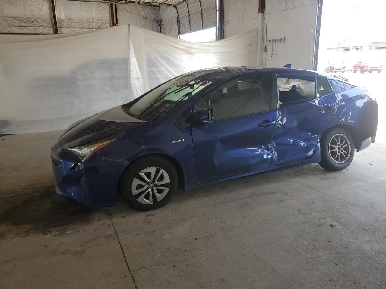 2017 Toyota Prius Two Eco, VIN JTDKARFUXH3528174 — Side