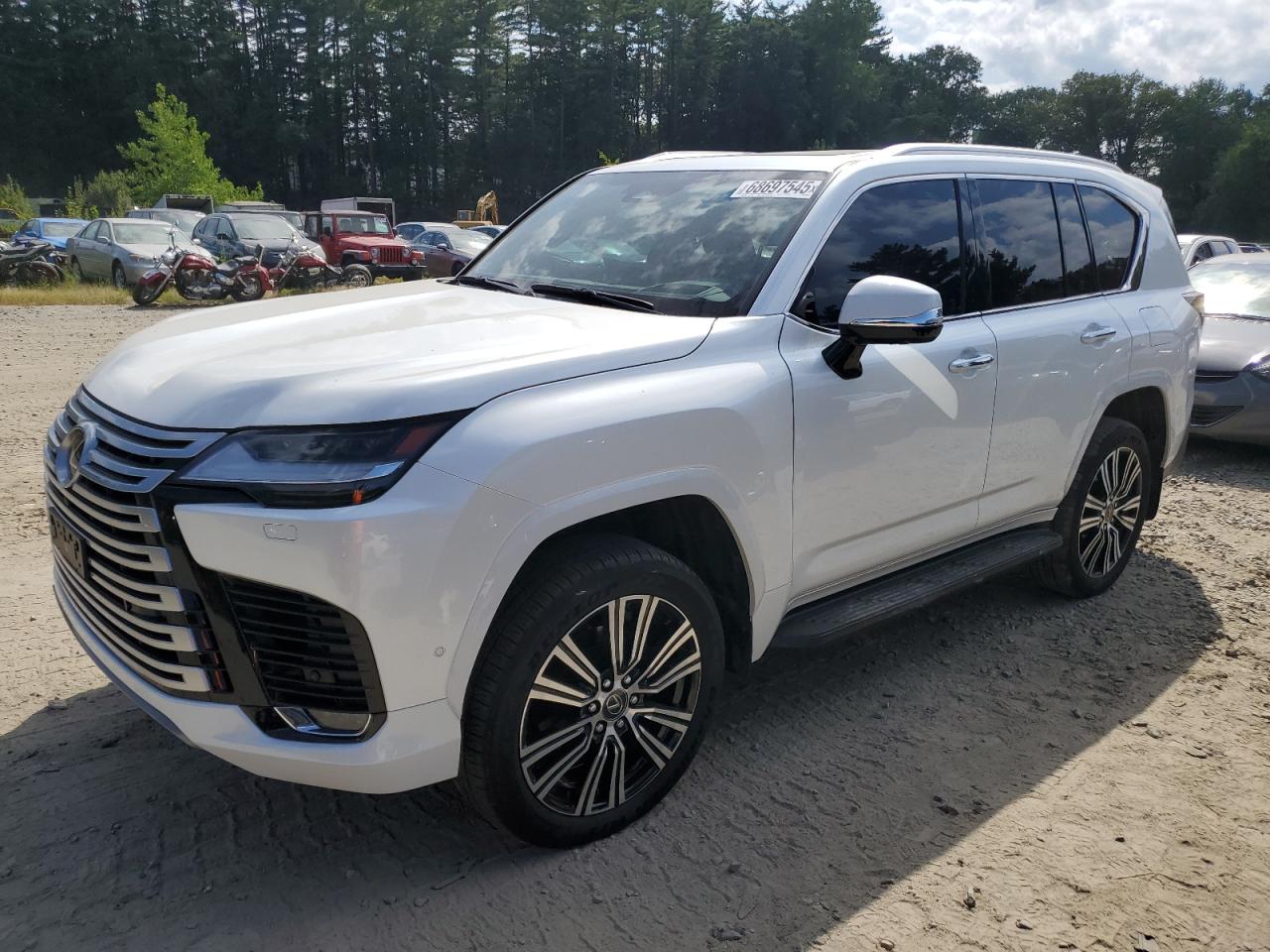 2025 Lexus LX 700H OVERTRAIL, VIN JTJGD7CX6S4000226 — Rear end