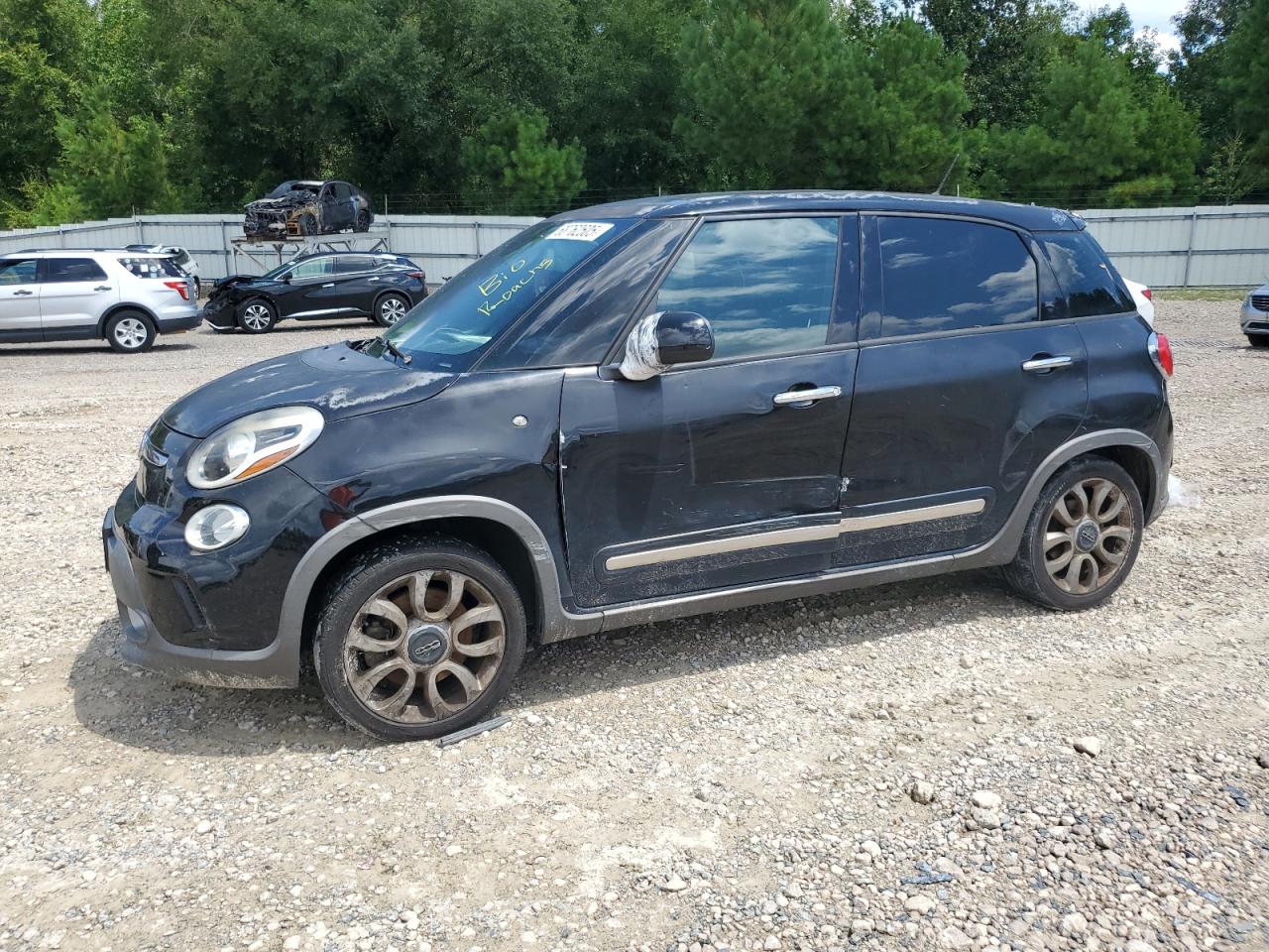 2015 FIAT 500L Urbana Trekking, VIN ZFBCFADH1FZ033341 — Rear end