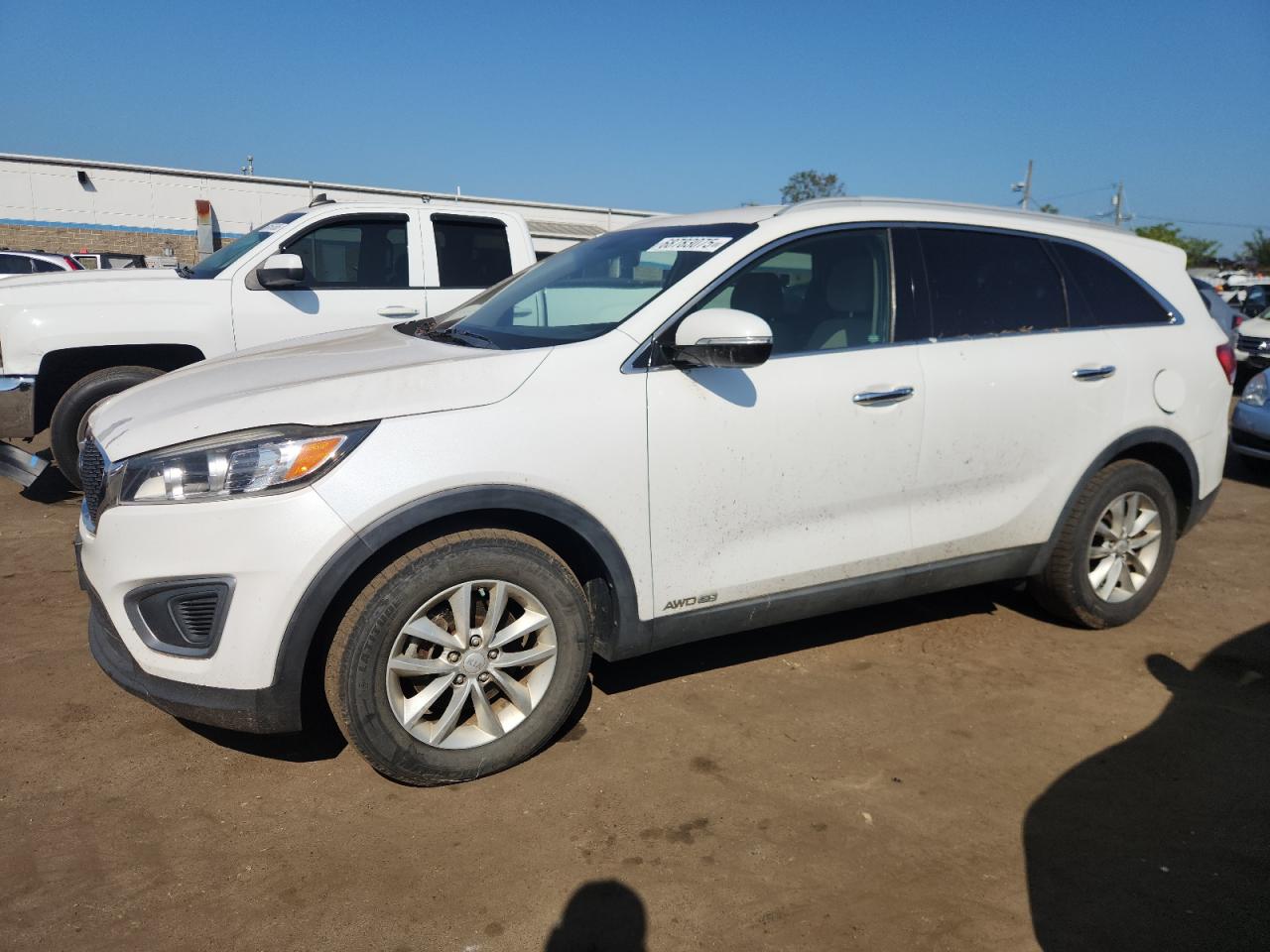 2016 Kia Sorento LX, VIN 5XYPGDA50GG003674 — Normal wear