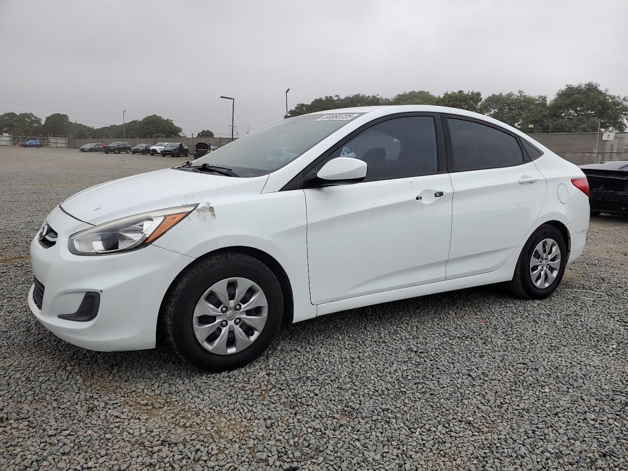 2015 Hyundai Accent GLS, VIN KMHCT4AE5FU884777 — Vandalism