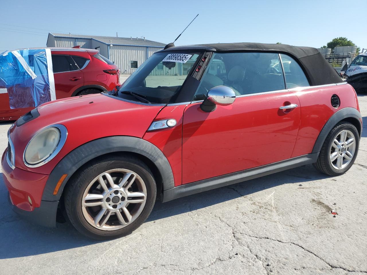 2011 MINI Convertible, VIN WMWZN3C51BTZ78247 — Бок