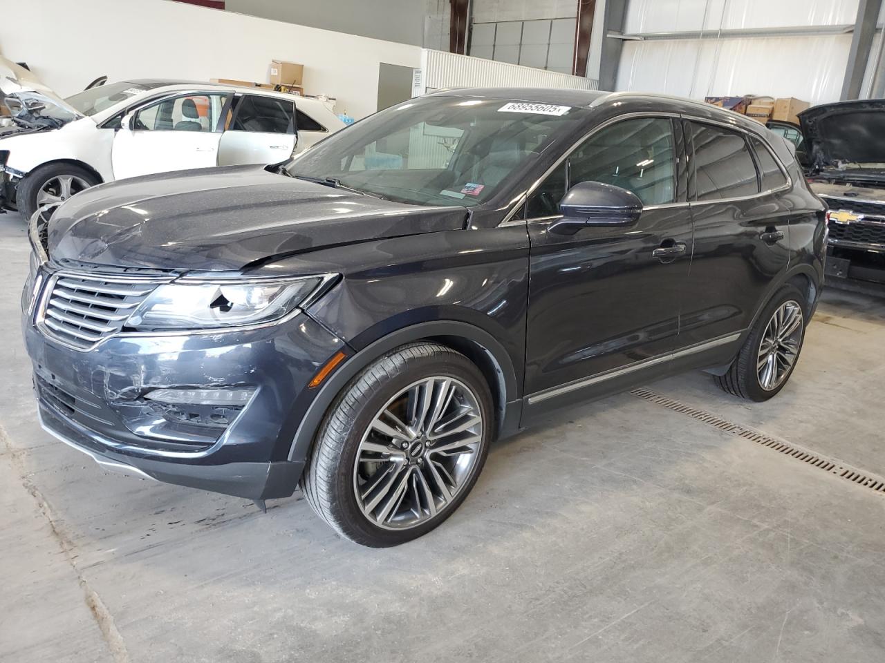 2015 Lincoln MKC, VIN 5LMTJ2AH5FUJ35303 — Frame damage