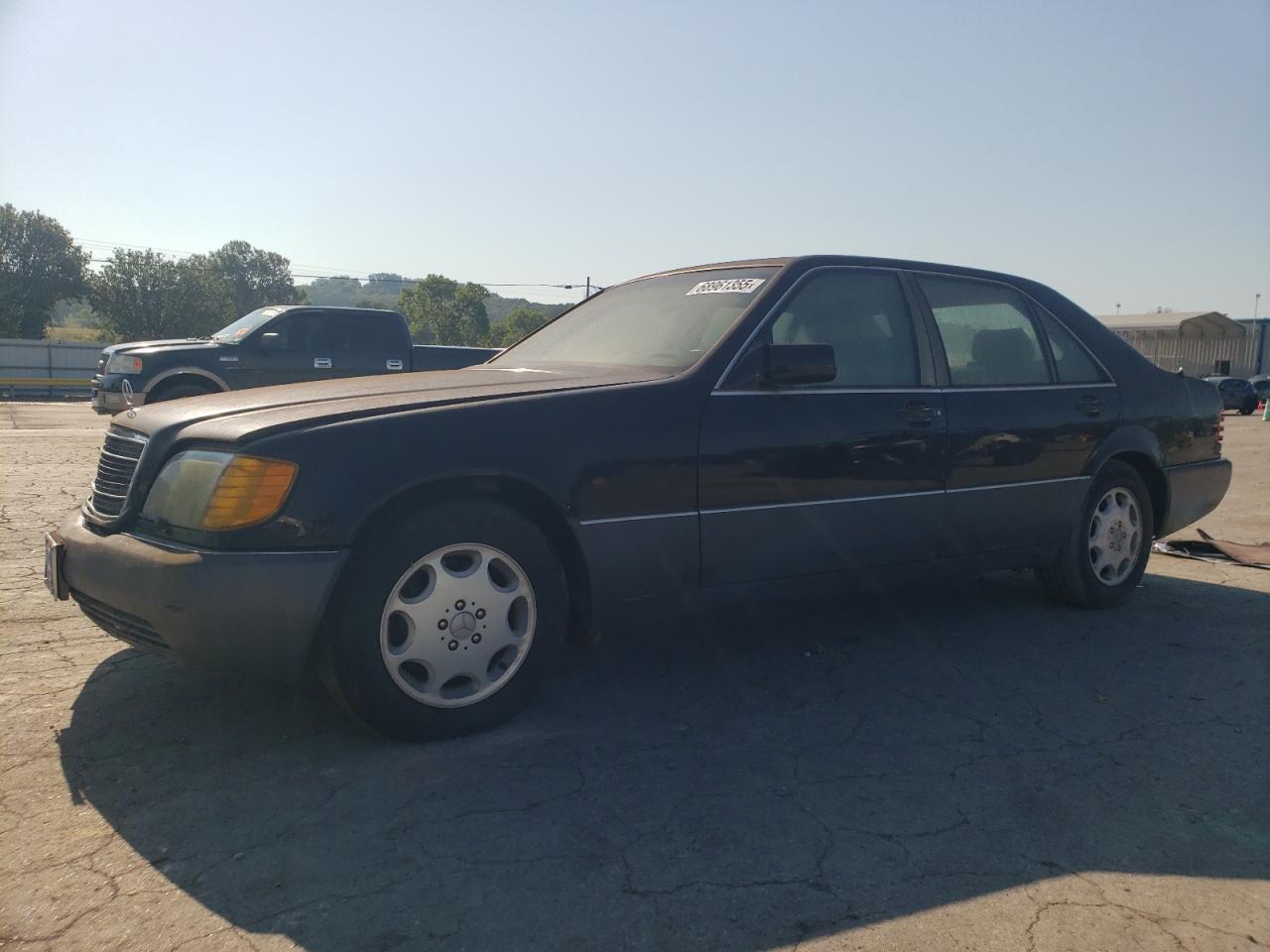 1993 Mercedes-Benz 500, VIN WDBGA51E6PA099154 — Side